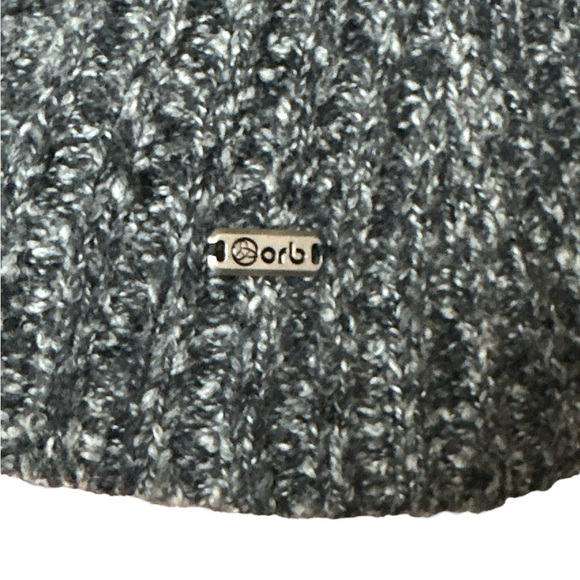 Orb knit sleeveless sweater vest with waist and neck closure cable knit sections - Picture 6 of 7